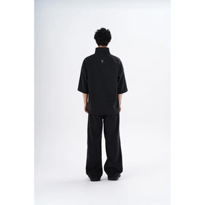 "Back view of the YAD Dark Grey Pants and Top on a male model - Featuring a minimalist and sleek design for modern urban fashion."